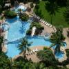 Our East Pool consists of two large pools separated by a divider wall with fountains sprinkling each side.